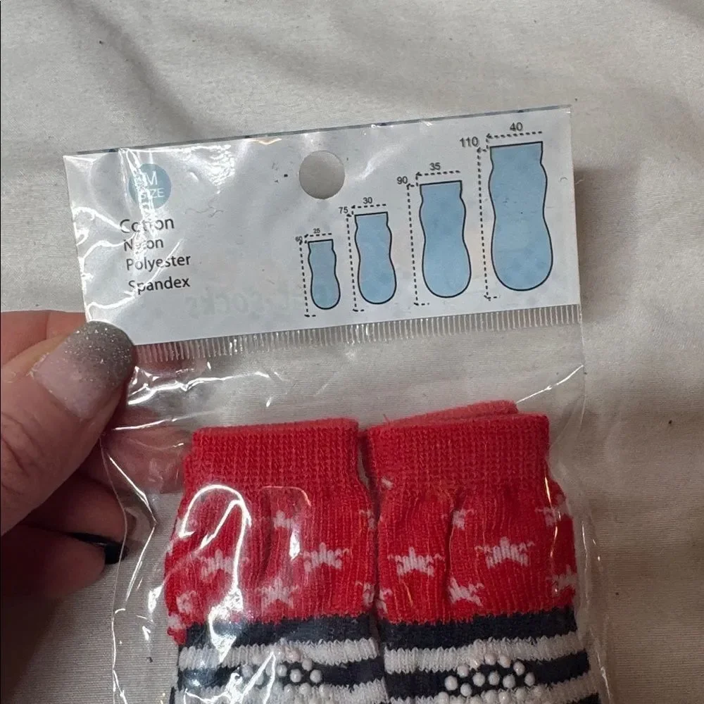 Three Sets Of Dog Socks. Size Medium. New.